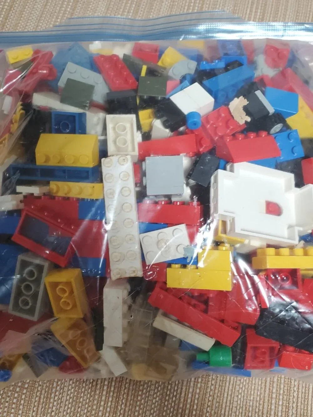 Lot of four pounds of assorted legos. Most from 1999-2009